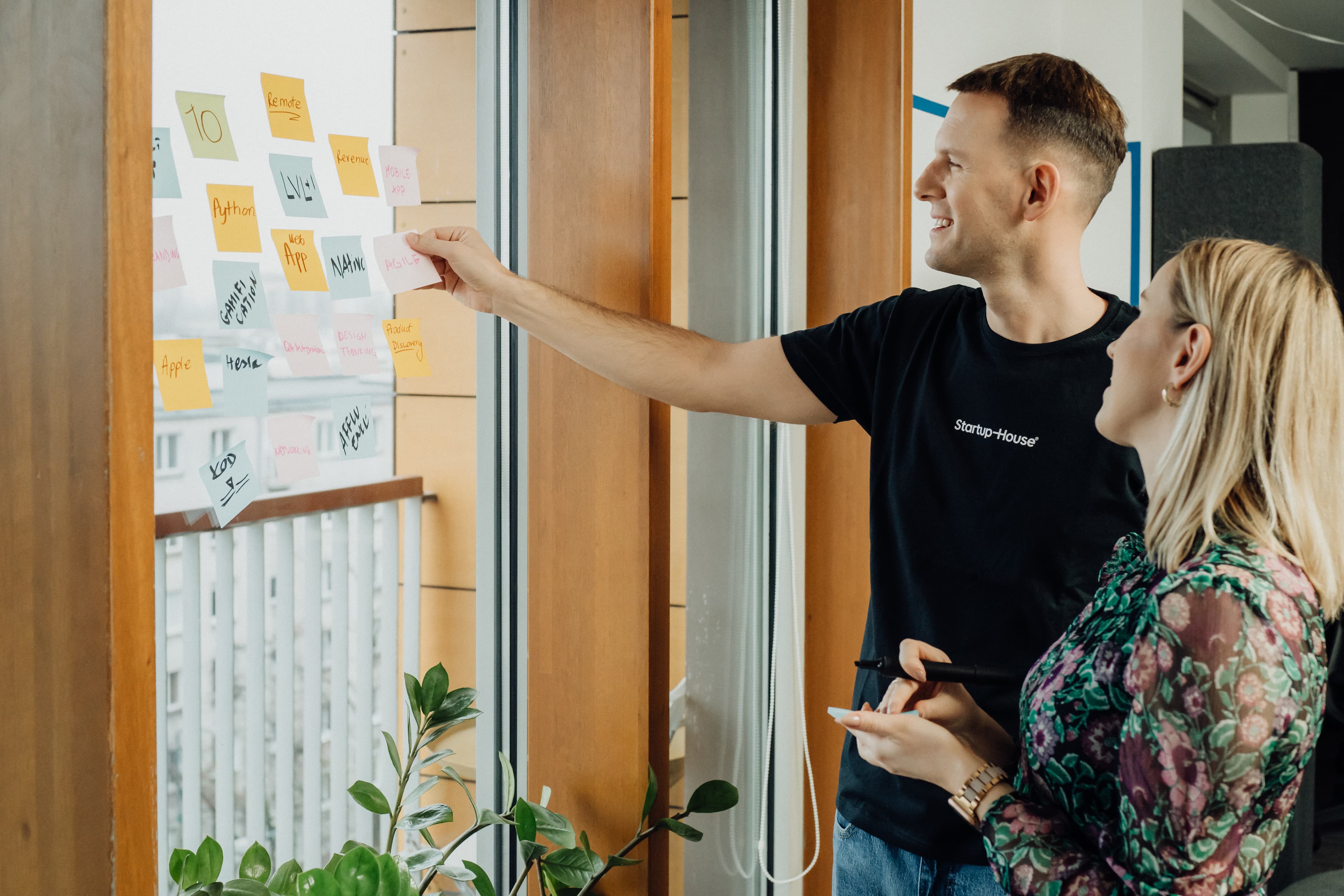 Illustration of a cross-functional product team collaborating in a modern software house